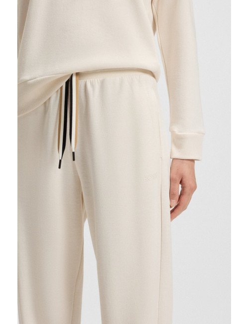 Pantalon de survêtement resserré au bas des jambes avec cordons à rayures emblématiques